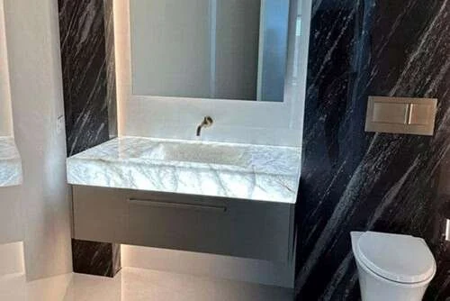 Integrated natural stone sinks